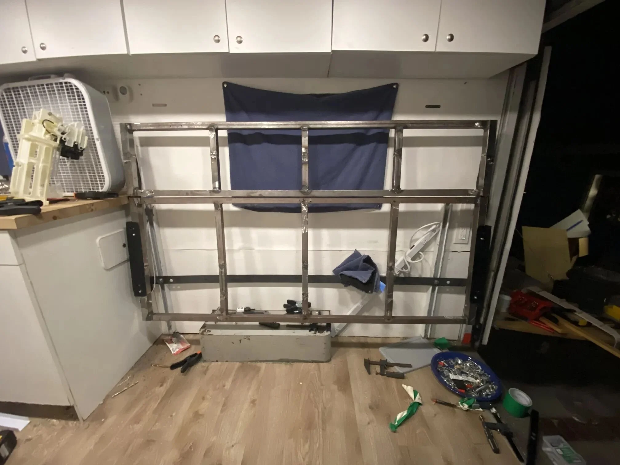 Re-sized and re-welded folding couch-bed frame