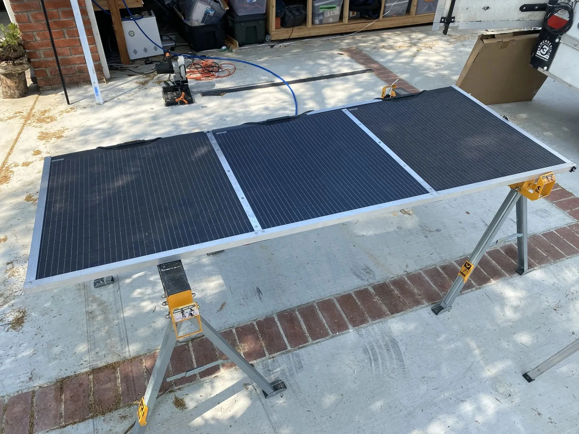 Flexible panels needed bracing/stiffening/wind-shielding. Even with the added aluminum, the panels were still 3x lighter than traditional panels.