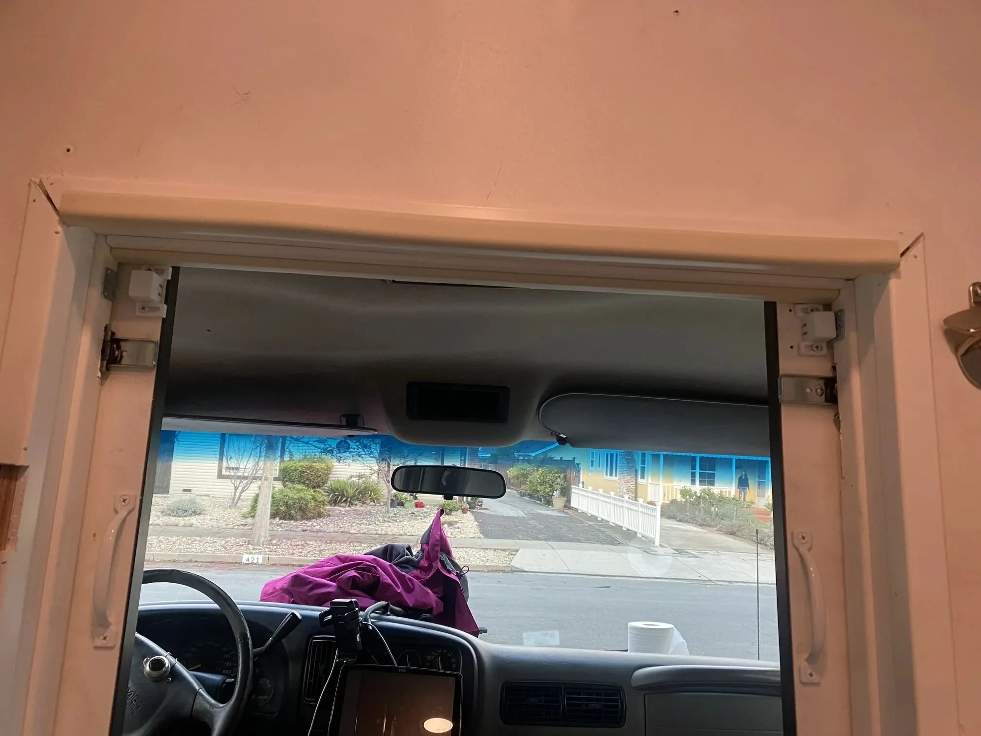 Sliding front cabin doors, magnetically latched